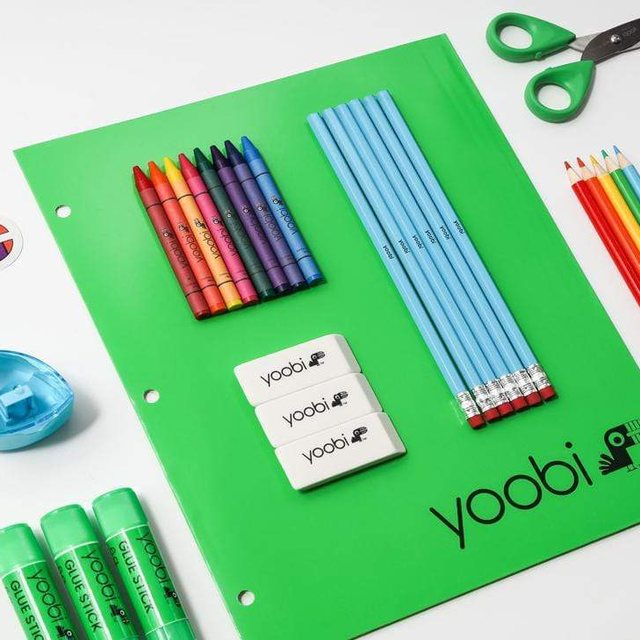 Yoobi school supply kit: crayons, pencils, erasers, glue sticks, scissors, and folder